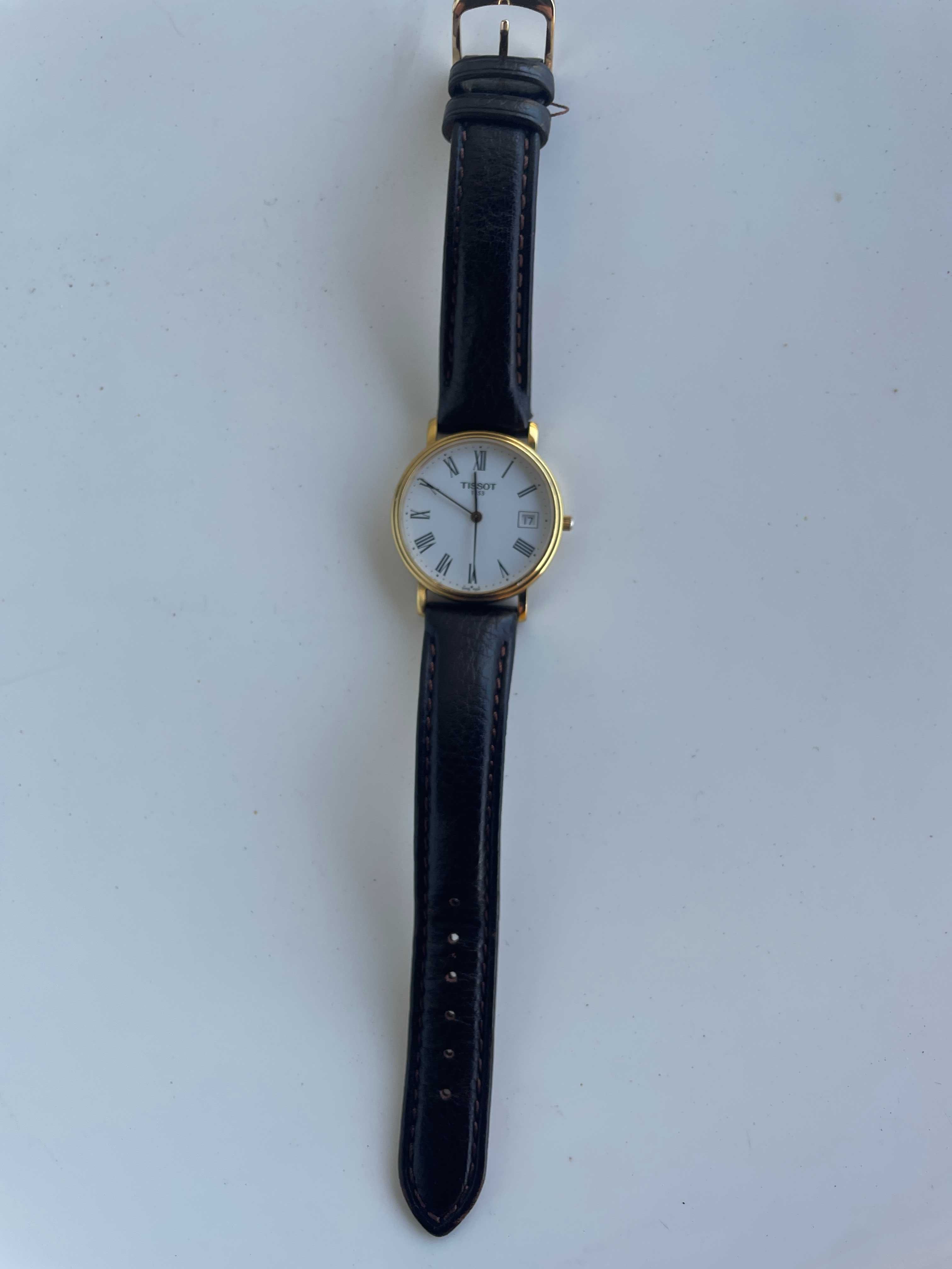 Relógio  Tissot clássico, números romanos