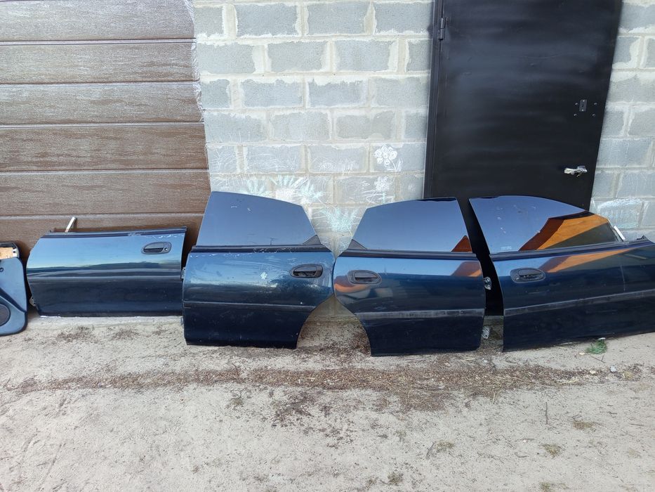 Продам двері для таких авто: peogeot 405; Lanos; Scorpio1,2;Mazda 323f