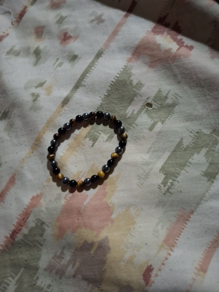 Pulseira castanha e preta