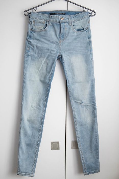 Spodnie jeansy jasne Bershka 34