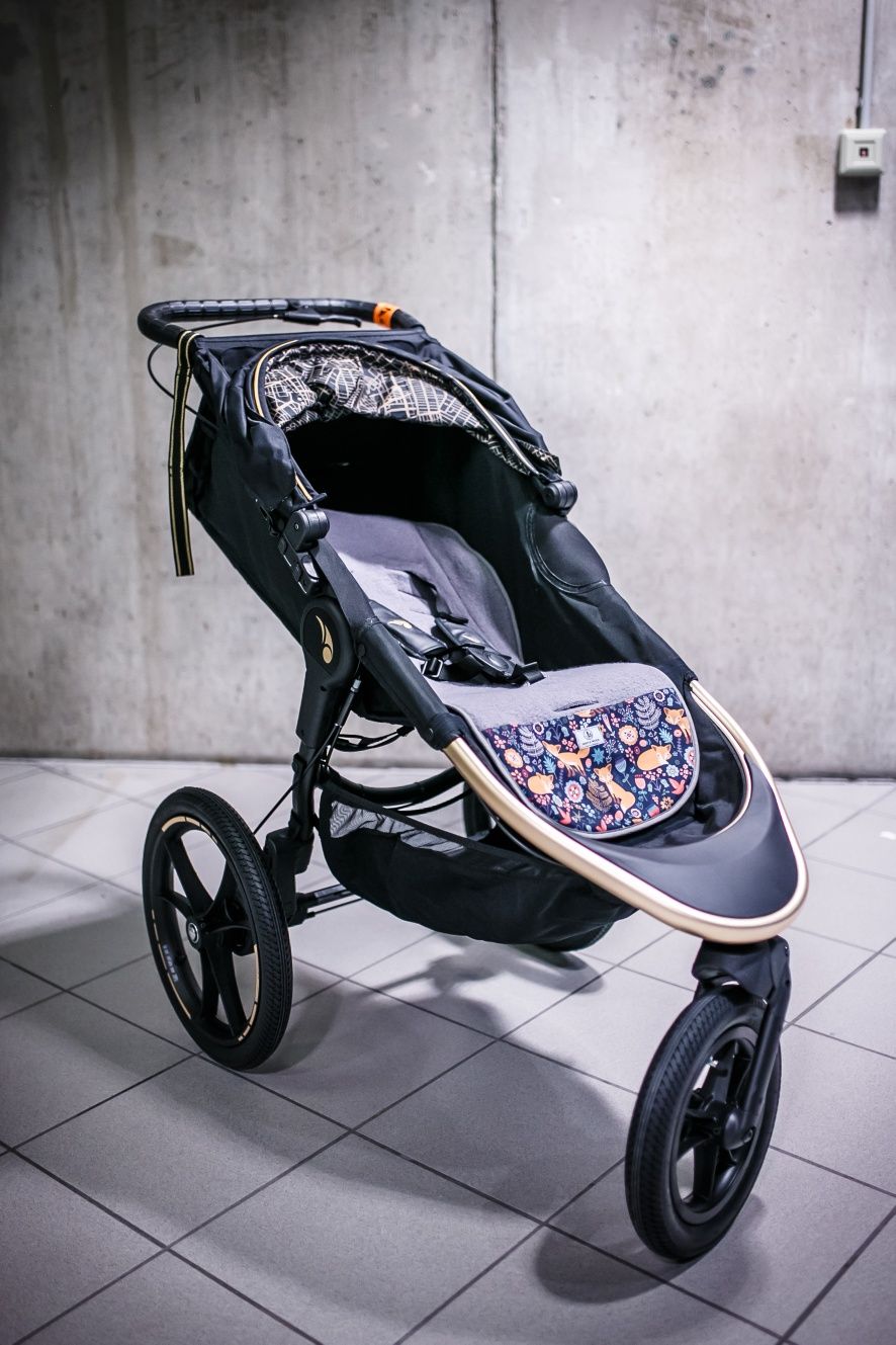 wózek joggingowy spacerówka Baby Jogger Summit X3 Gold Robin Arzon