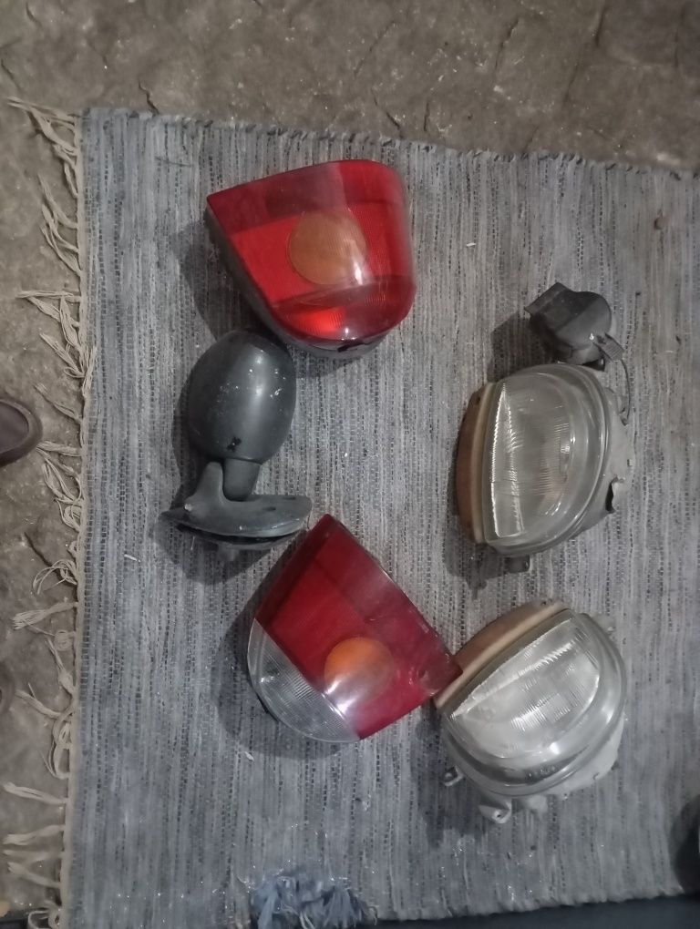 Óticas e farolins Twingo