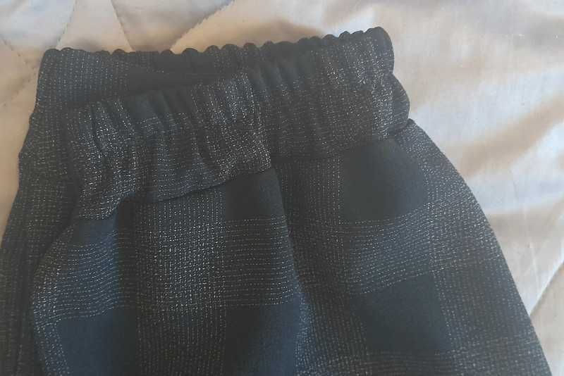 Spodnie damskie szerokie w kratę