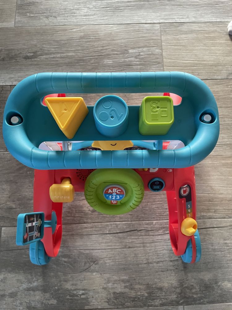 Pchacz do chodzenia i zabawy Fisher Price