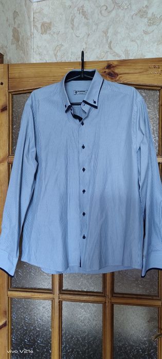 Сорочки чоловічі і штани.