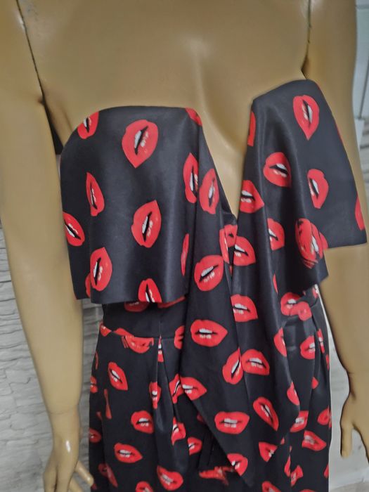 Kombinezon na lato elegancki Guess rozm M w usta