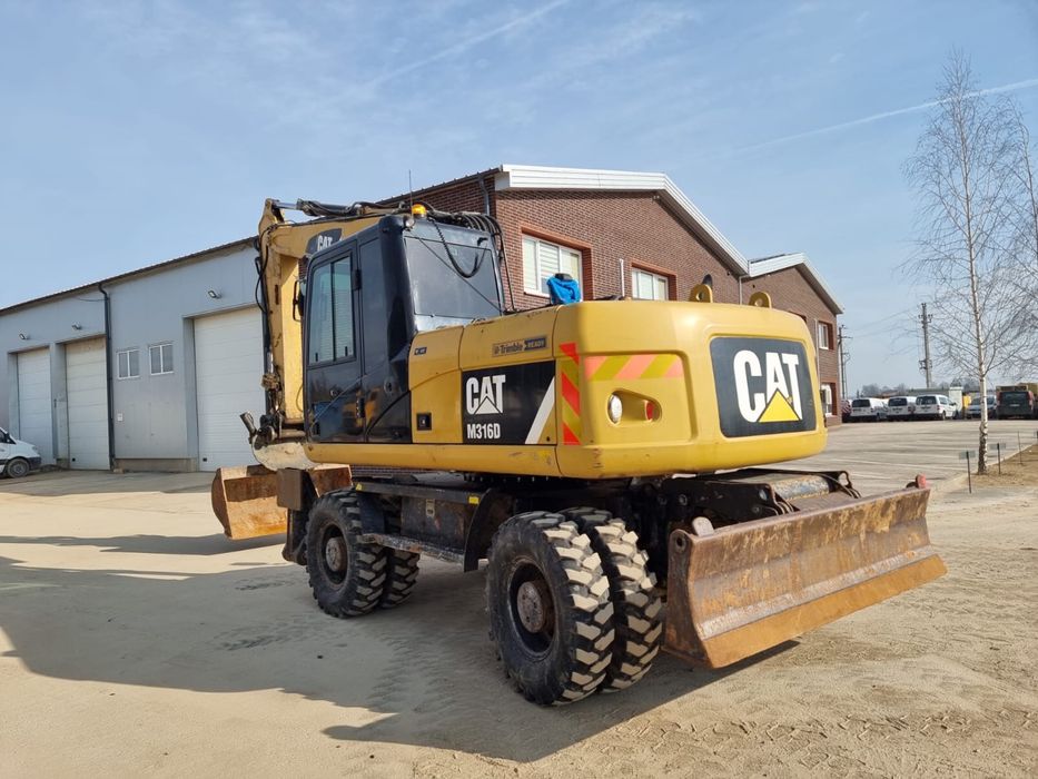 Продам колесный экскаватор Caterpillar М 316 D , 2012 г