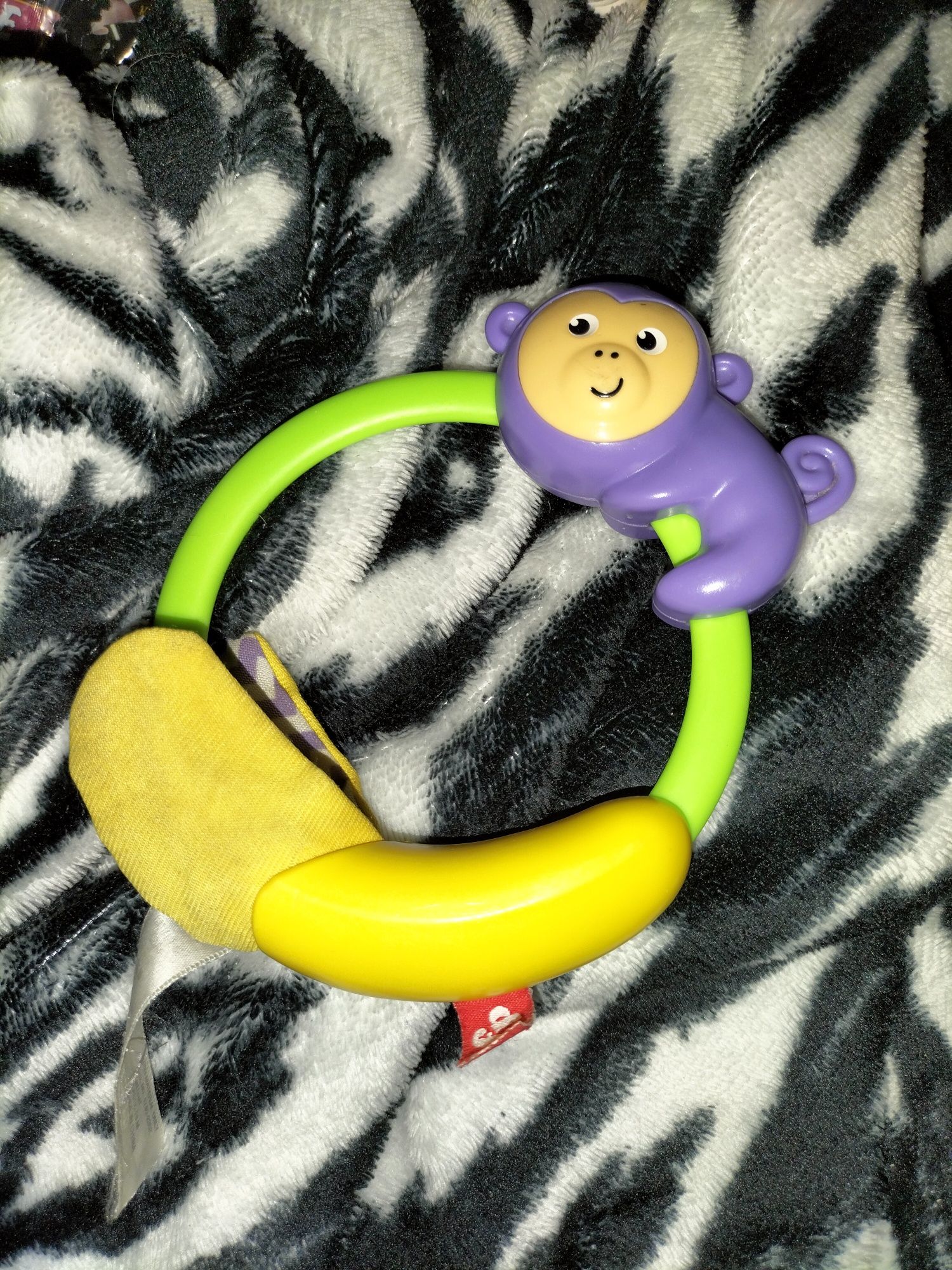 Sensoryczna zabawka małpka Fischer Price