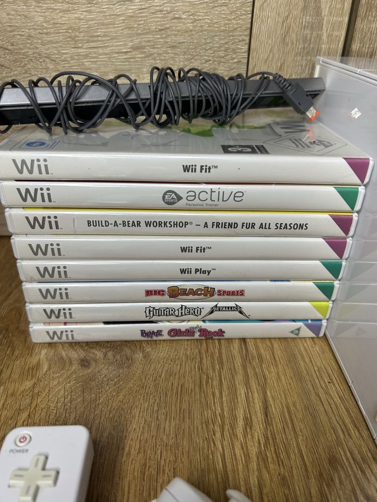 Konsola Wii + kontrolery + gry
