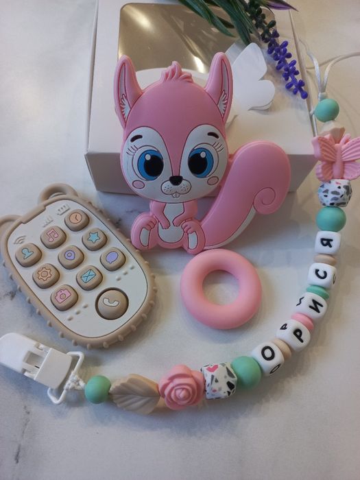 Тримач для пустушки,гризунець