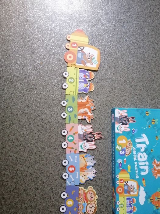 Гра пазл Звірі на поїзді