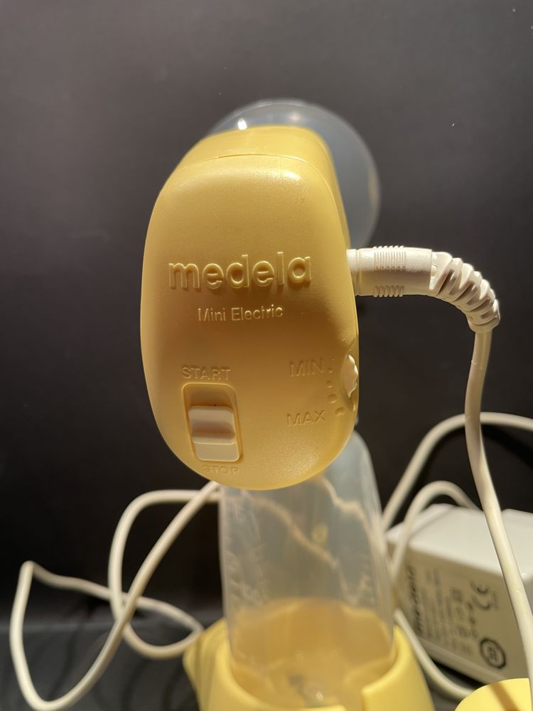 Молокоотсос Medela mini electric