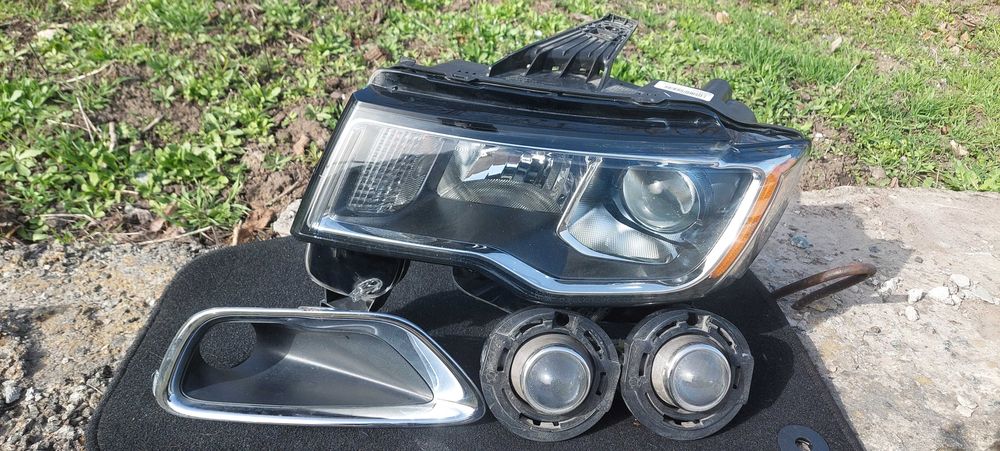 Фара Гранд Черокі ліва з рамкою ПТФ