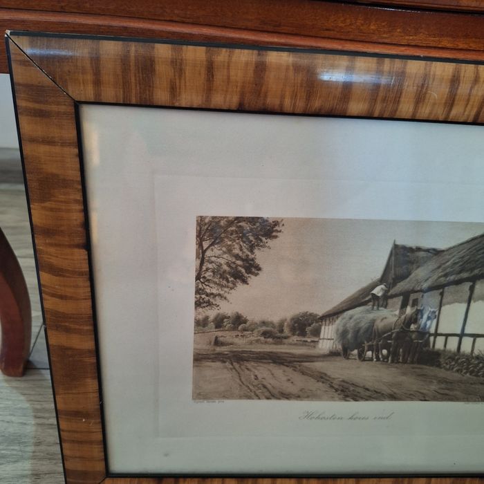 Obrazek przedstawiający gospodarza przy pracy