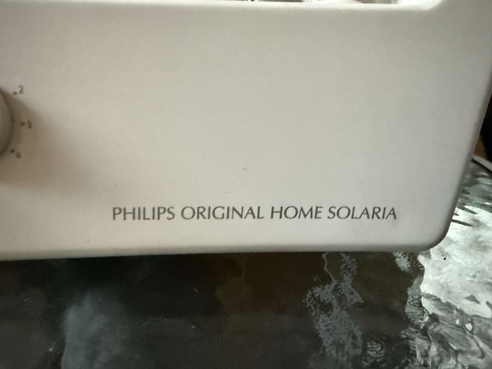 Solarium na twarz i dekold Philips