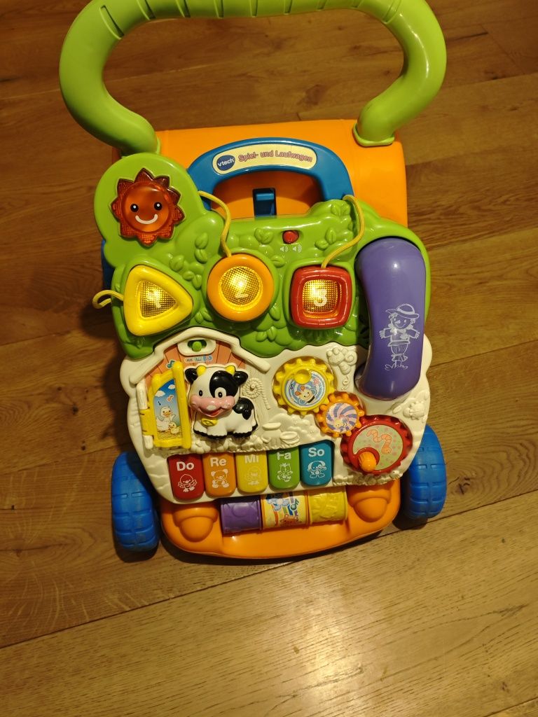 Pchacz jeździk vtech