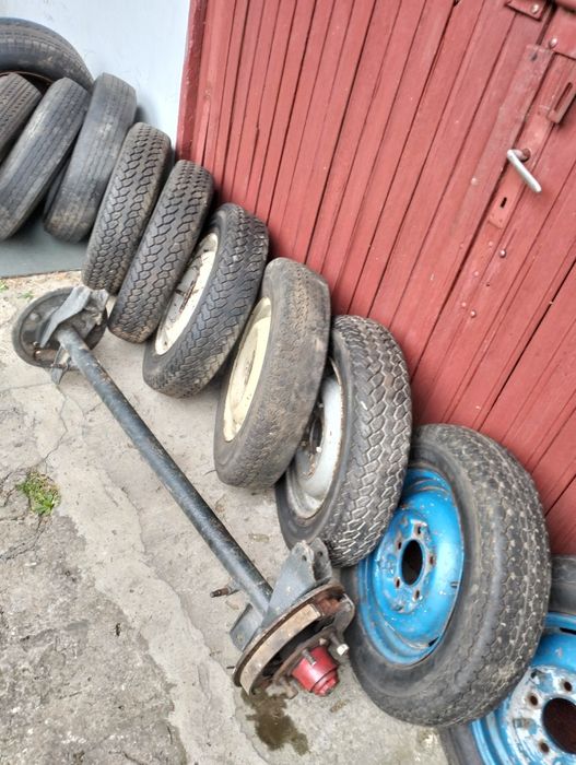 Sprzedam oś i opony z felgami do syreny lub do Warszawy