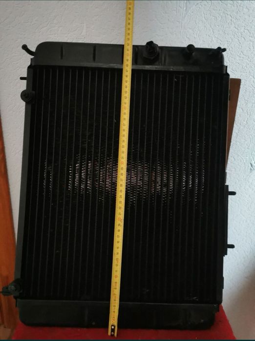 Радиатор москвич 412 2141. Электровентилятор диффузор.
Радиатор новый