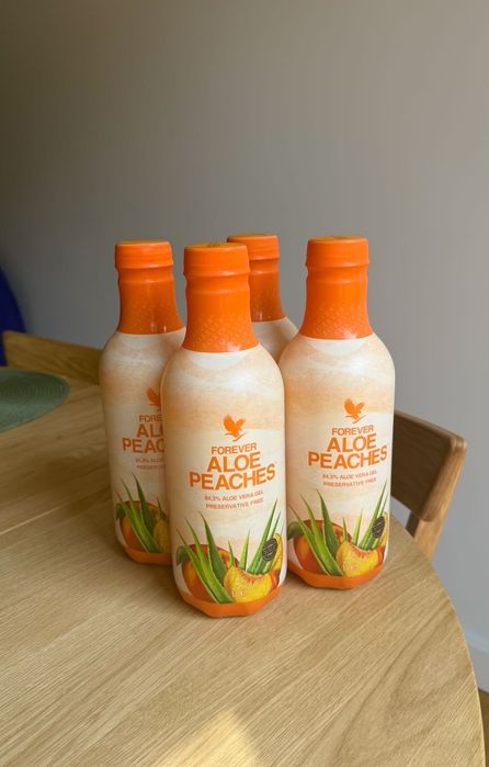 Cztery butelki aloesu Forever Aloe Peaches