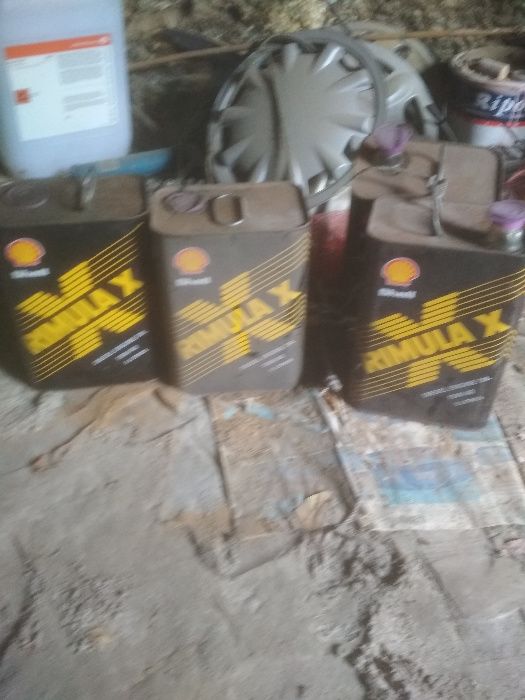 Latas antigas de lubrificantes Shell auto