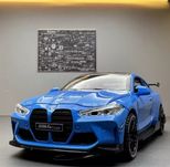 Zabawkowy samochod BMW M4 metalowy niebieski naped światła prezent