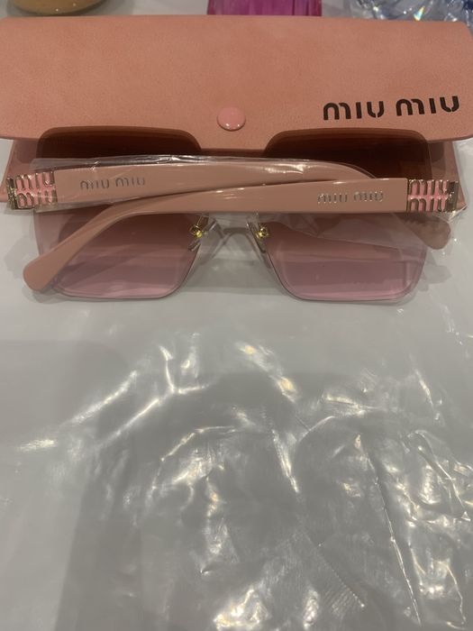 Oculos de sol miu miu