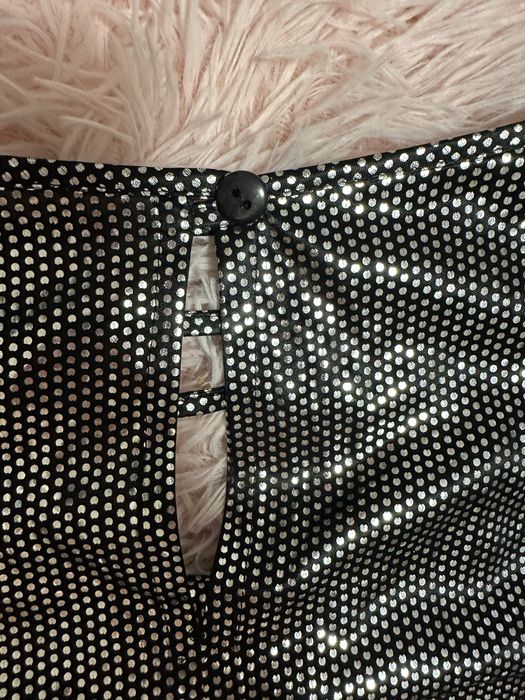 Damska bluzka z krótkim rękawem błyszcząca na Sylwestra