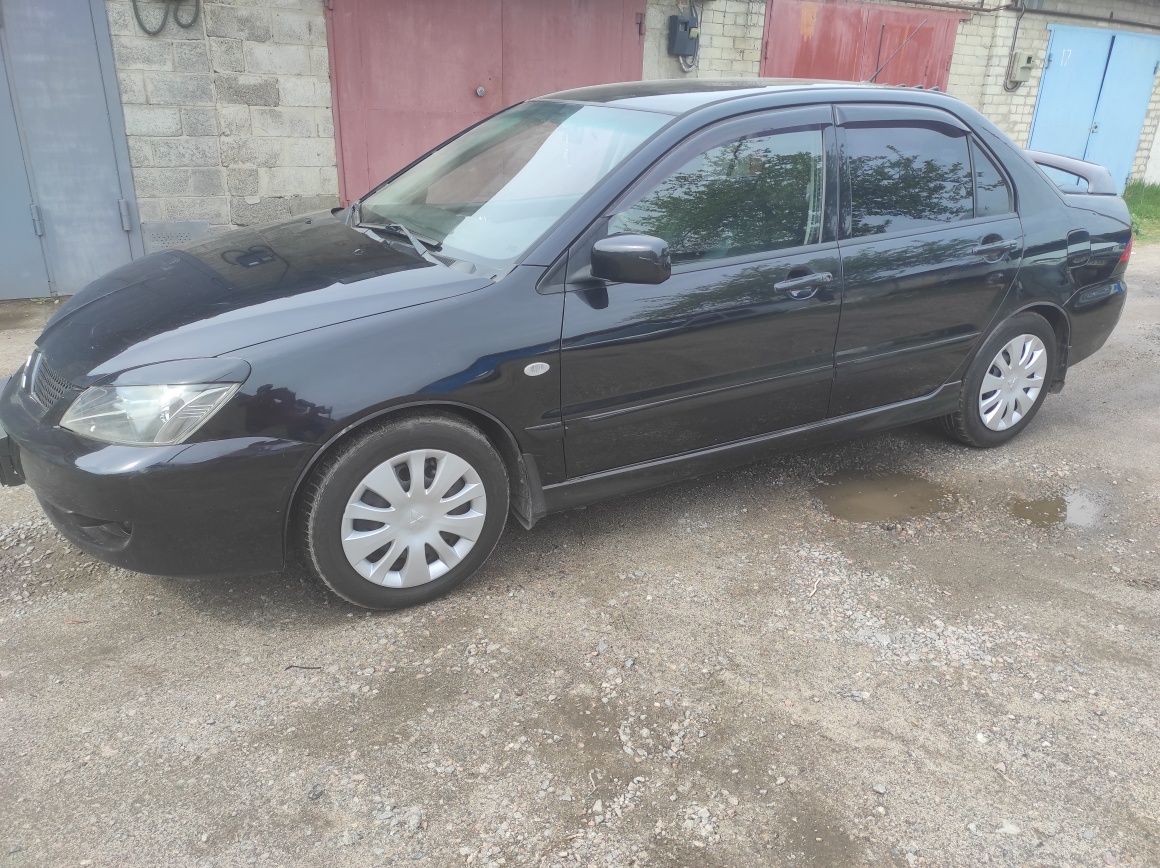 Лансер 9 1.6 газ 4 Lanser 2005 год Mitsubishi