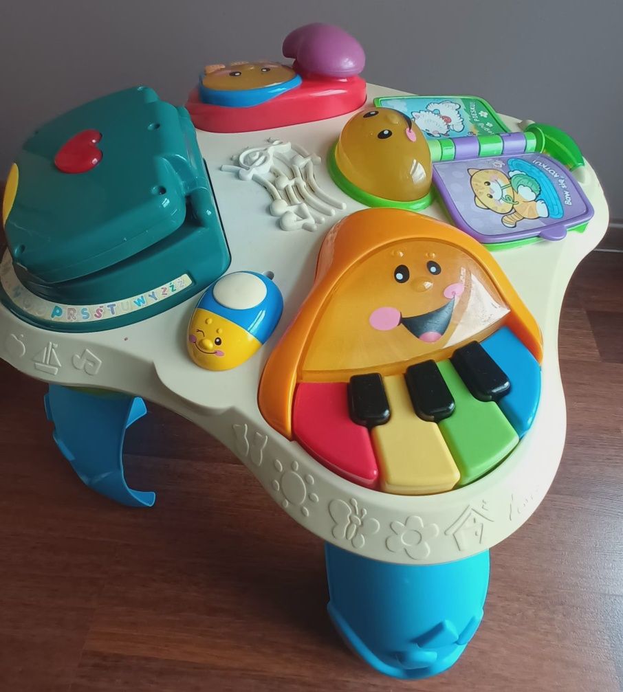 zabawka edukacyjna Fisher Price pchacz stoliczek interaktywny chodzik