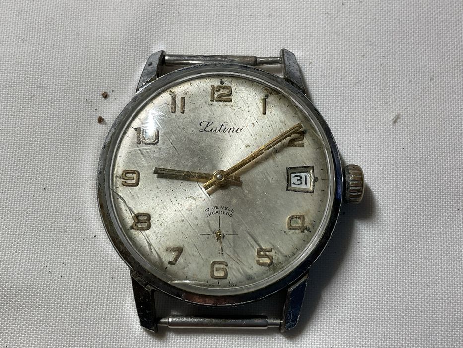 Relogio antigo mecanico marca Latino