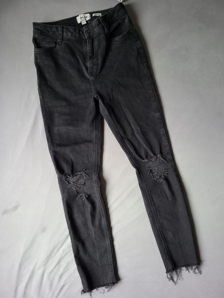 Spodnie jeans z dziurami wysoki stan 40