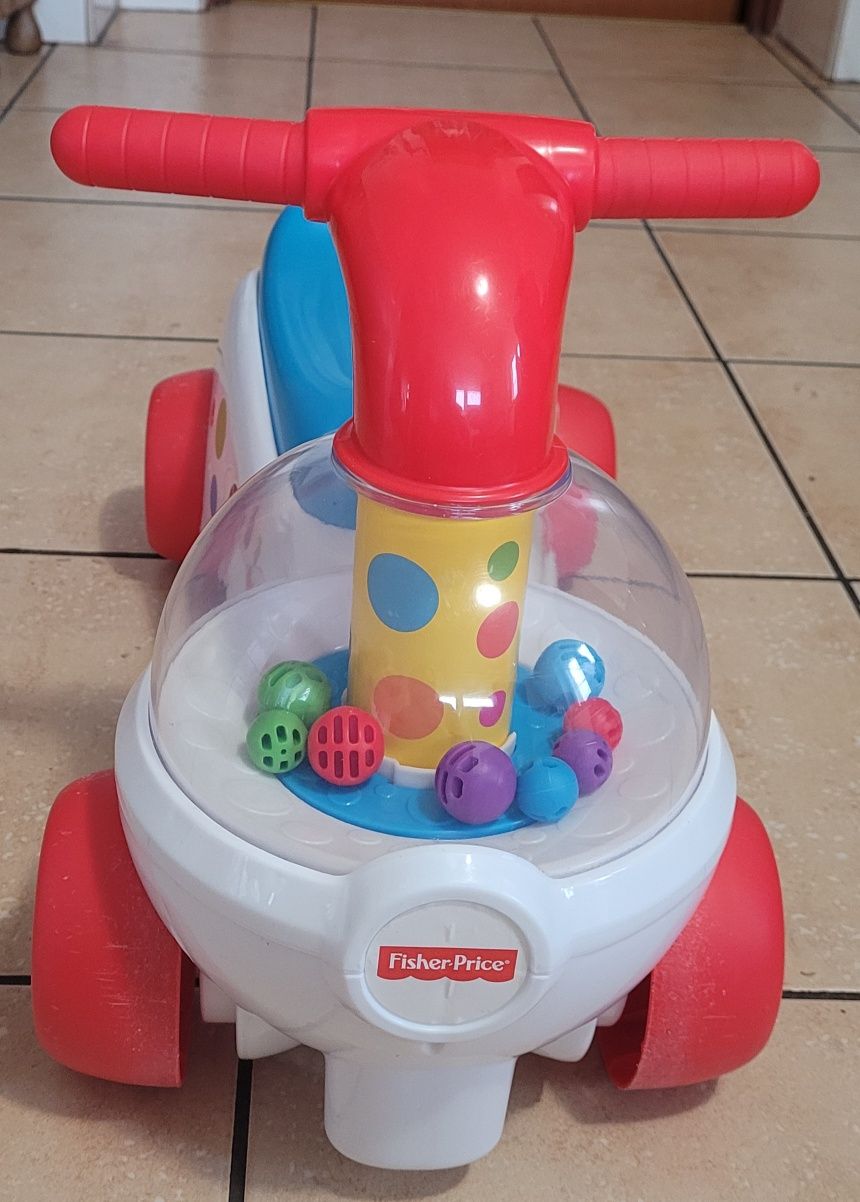 Fisher Price Jeździk z wirującymi piłkami