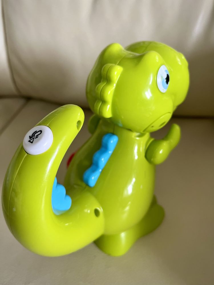Детская музыкальная игрушка- фонарик динозаврик