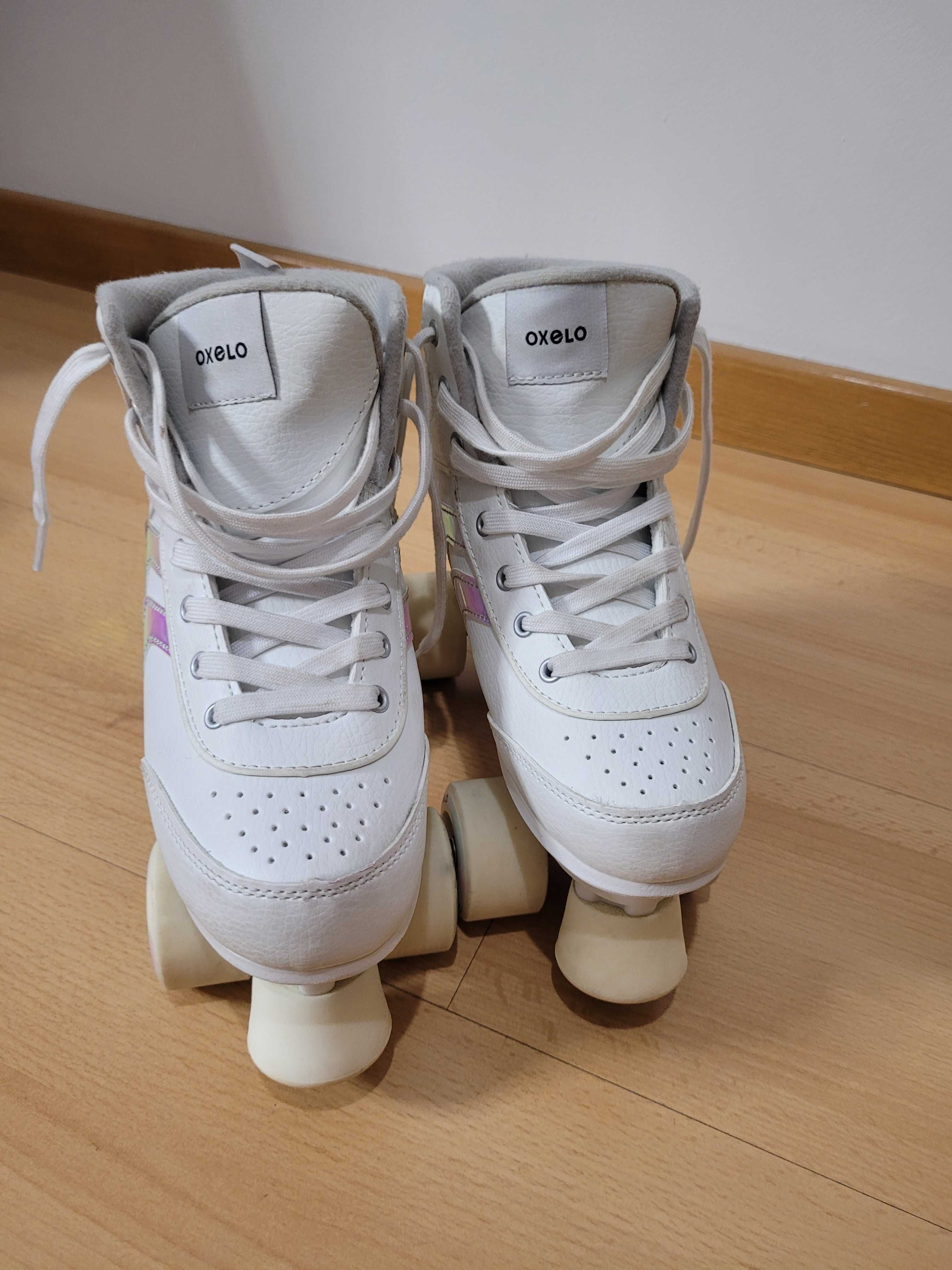 Patins 4 rodas Oxelo tamanho 37, com saco.