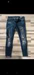 Spodnie jeans podarte