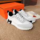 Białe skórzane buty sportowe Hermes
