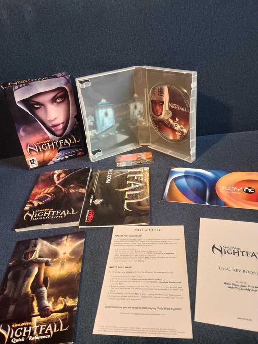 Guild Wars Nightfall z plakatem