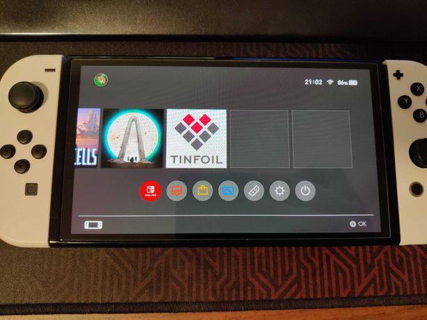 Nintendo Switch Oled desbloqueada com vidro temperado e cartão de 64gb