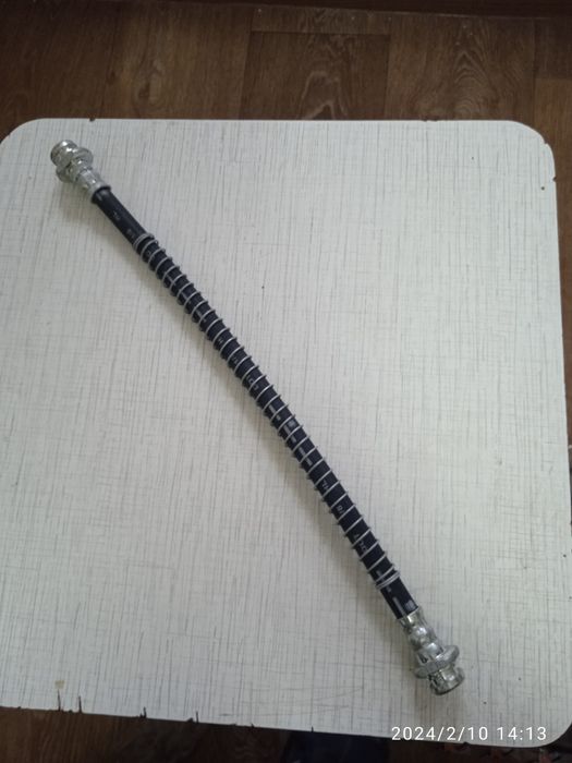 Передня тормозна шланга на Мітсубісі галант,лансер 1989-1993г.в