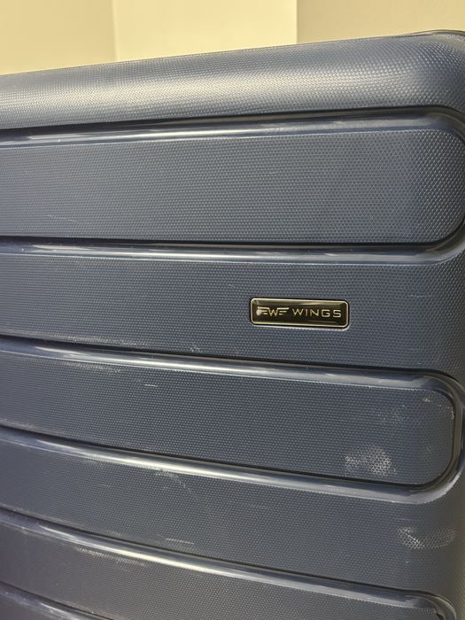 Дорожні валізи розмір л і м