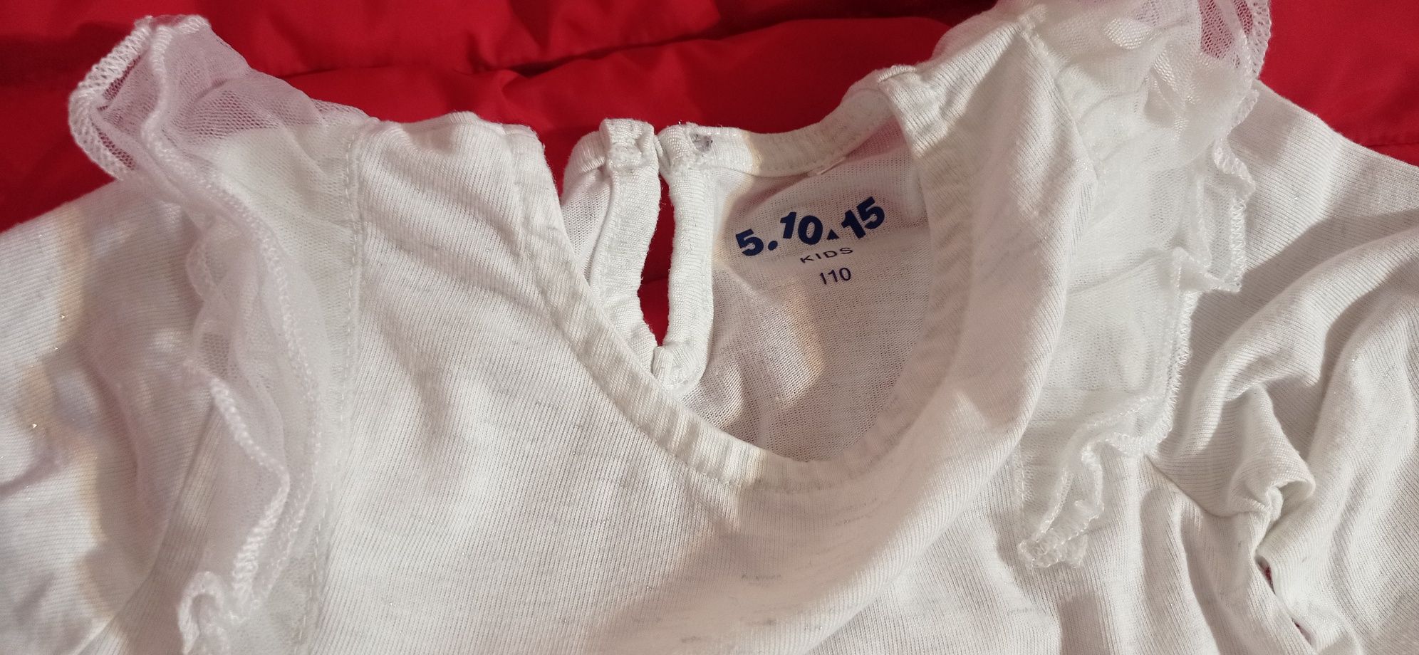 Biała bluzka z falbankami 110