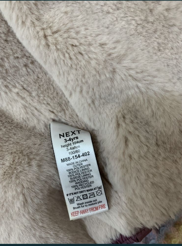 Продам дитячу зимову курточку Next