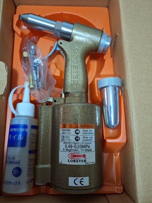 Pistola pneumatica de rebites