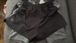 Krotkie spodenki biegowe Under Armour M