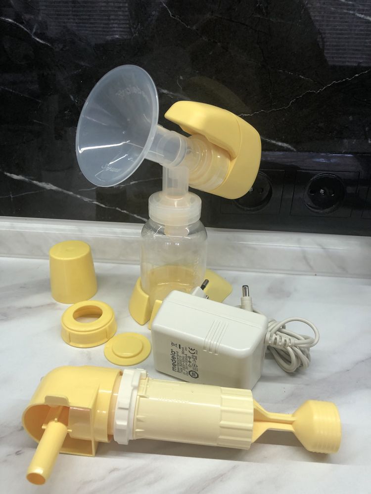 Новый Молокоотсос Medela Mini Electric