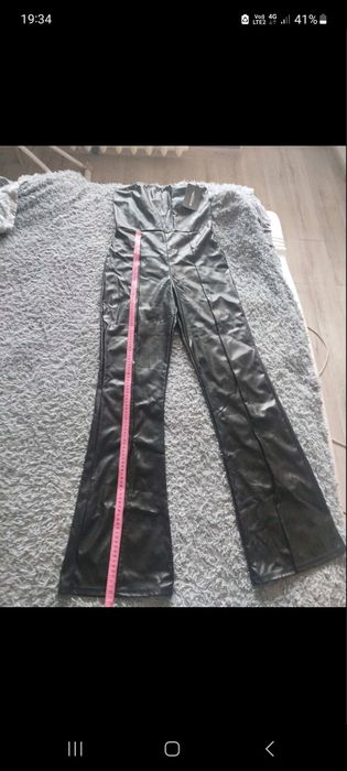 Комбинезон брючный из эко-кожи клеш разрез Pretty Little Thing