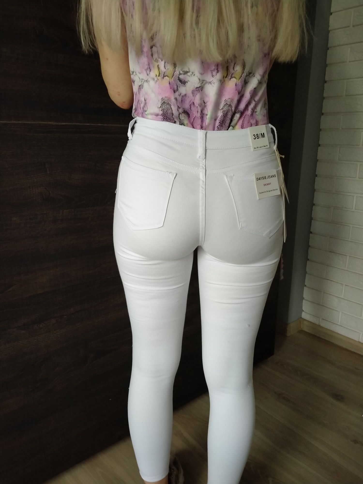 Spodnie białe jeansowe jeansy dżinsowe dżins postrzępione z dziurami