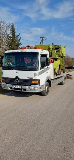 Pomoc drogowa. Autolaweta.Usługi transportowe.