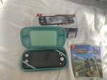Nintendo switch lite + 2 gry i pokrowiec