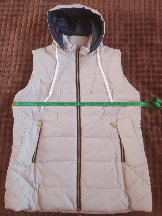 Жіноча осіння жилетка